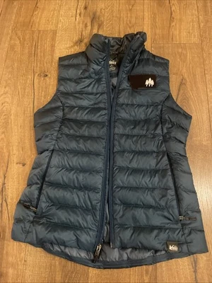 Chaleco acolchado REI cooperativo 80 % plumón de pato sin mangas - pequeño para mujer con logotipo de Montana Foto 1 de 4