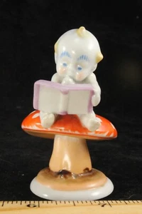 Vintage Metzler Ortloff Germany Kewpie on Mushroom Reading Book Figurine - Picture 1 of 6