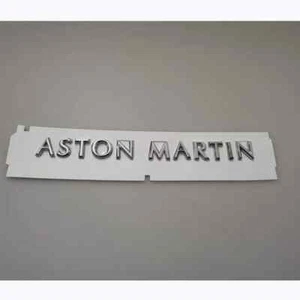 ✰✰✰✰🌟🌟 1X NEW Aston Martin Script Badge Rear Emblem JY53-001B40-AA - Bild 1 von 4