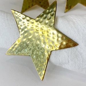 Juego de 11 soportes de anillo de servilleta estrella de latón macizo martillado India vintage - Imagen 1 de 7