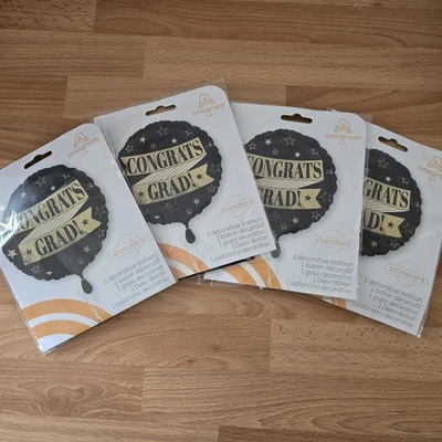 Lote de 4 "¡Felicidades Grad!" Globos de Lámina 17" Anagrama Negro Oro Estrella Diseño Gradua Foto 1 de 2
