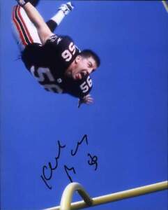Keith Brooking signed NFL football 8x10 photo W/Cert Autographed 02