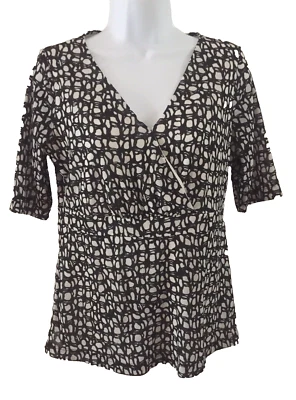 Blusa vintage Y2K Jaclyn Smith mediana negra blanca envolvente simulada manga corta Foto 1 de 4