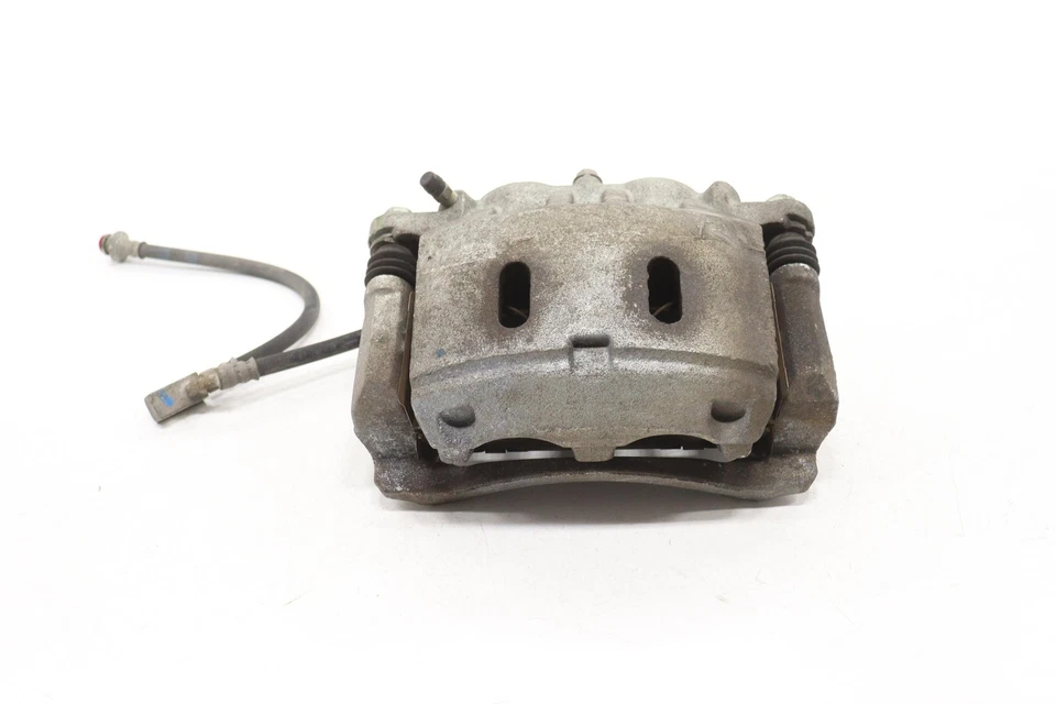 Pinza de freno de disco delantera izquierda Nissan Armada 2005-2024 OEM Foto 1 de 4