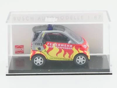Busch 48989 Smart Fortwo Fire Department Lindau 1:87 H0 Mint! OVP 1703-31-87 - Image 1 of 2