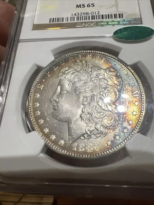 Dólar de plata Morgan 1887 NGC+CAC MS65 $1 tóner Foto 1 de 4