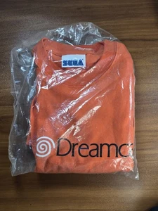 Vintage 1999 Official Sega Dreamcast Orange Promo Graphic T-Shirt NEW - Bild 1 von 2