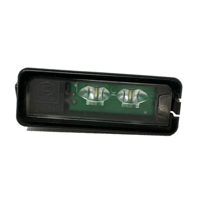 OEM Volkswagen Rear License Plate LED Light - CC Golf GTI Beetle OEM #1K8943021D Foto 1 de 4