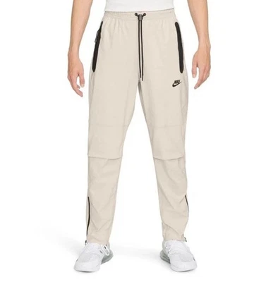 Pantalones Nike Tech tejidos de gran tamaño negro orewood claro HM7158-104 para hombre talla mediana Foto 1 de 4