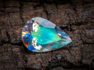 1,94 Karat Goldener Regenbogen Mondstein Edelstein Facettiert 10x7x4 mm Birnenform - Bild 1 von 3