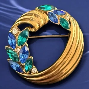 Broche circular de diamantes de imitación azul verde tono dorado mediados de siglo joyería vintage - Imagen 1 de 8