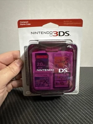 Estuche compacto Power A Nintendo 3DS, púrpura transparente, tiene capacidad para 16 tarjetas de juego Foto 1 de 2