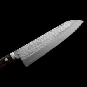Coltello Masutani n.19 Gyuto VG1 acciaio inox finitura martellata con supporto - Foto 1 di 7