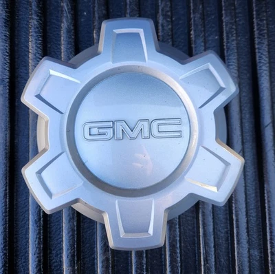 2019-2024 GMC Sierra 1500 Silver Steel Wheel Center Cap 84173372 OEM - Image 1 of 4