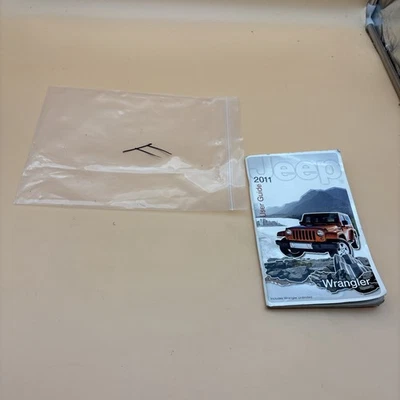 MANUAL DO PROPRIETÁRIO JEEP WRANGLER 2011 com tampa plástica incluída - Imagem 1 de 3