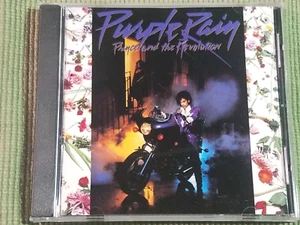 PRINCE AND THE REVOLUTION PURPLE RAIN 9 TRACK CD w/LET'S GO CRAZY WHEN DOVES CRY - Picture 1 of 2
