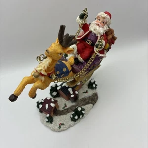 Santa Claus & Reindeer Flying Sleigh Over Christmas Village Figurine 7" Resin - Picture 1 of 18