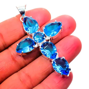 Colgante de corte de pera cruzada de piedra preciosa de topacio azul suizo hecho a mano de plata esterlina 925 - Imagen 1 de 3