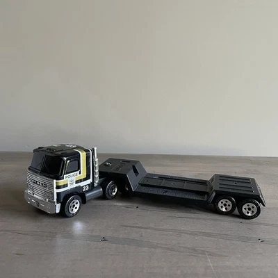 BUDDY L MACK POLICE 23 HELICÓPTERO TRANSPORTADOR TRACTOR Y REMOLQUE Foto 1 de 4