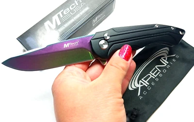 Cuchillo de bolsillo con bloqueo de botón manual rodamiento de bolas pivote EDC hoja arco iris Mtech Foto 1 de 4