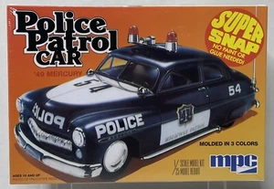 MPC SUPER SNAP 1:25 MASSSTAB 1949 QUECKSILBER POLIZEI PATROUILLENAUTO MODELLBAUSATZ MPC-705 - Bild 1 von 5