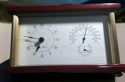 Reloj de cubierta de latón Seth Thomas con temperatura e higrómetro madera de cerezo Foto 1 de 4