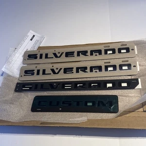 GM OEM 2019-2026 Chevrolet Silverado 1500 Custom Gloss Black Emblems - Picture 1 of 2