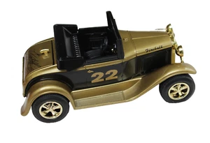 LIBERTY RACING CHAMPIONS MODELO DORADO A ROADSTER BANCO DE MONEDAS Y LLAVE ESCALA 1/25 - Imagen 1 de 9