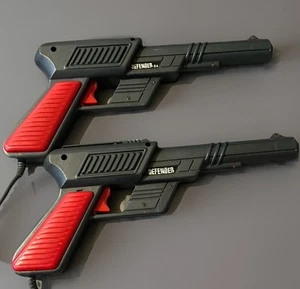 Commodore Cheetah Defender 64 lekki pistolet - Zdjęcie 1 z 2
