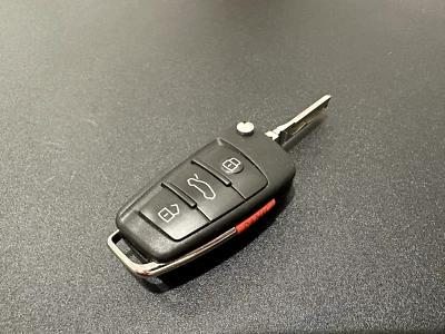 OEM Audi R8 FLIP KEY REMOTE FOB FCC: NBGFS04A71 DE420837220A (4-BUTTON) -LOCKED! - Image 1 of 4
