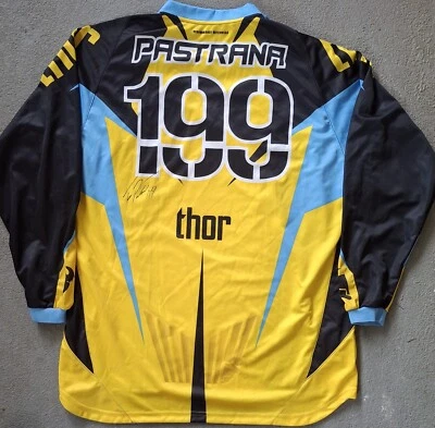 Camiseta deportiva firmada por Travis Pastrana #199 Thor Core - XL - CERTIFICADO DE AUTENTICIDAD JSA amarillo y azul Foto 1 de 4