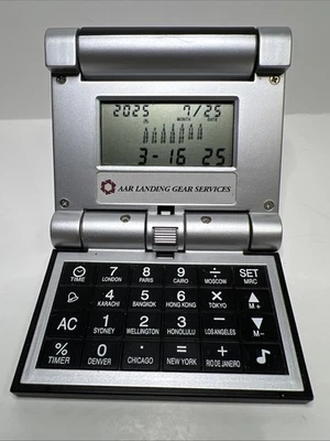 Collapsible Travel Alarm clock, calculator, world time, calendar, 3.5” Folded - Image 1 of 4