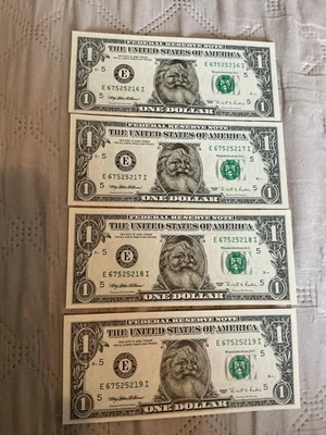 four 1995 Santa Dollars uncirculated - Image 1 of 4