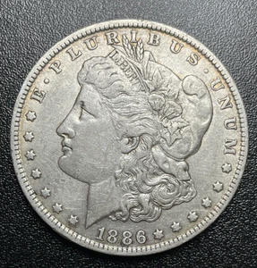 1886-O United States Morgan Silver Dollar - Picture 1 of 4