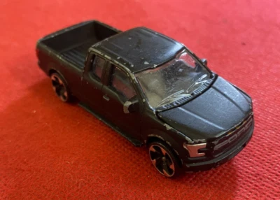 MAJORETTE Pickup FORD F-150 RAPTOR scala 1:72 N° 201C metallo Nero - Immagine 1 di 3