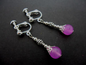 A PAIR OF PURPLE JADE DANGLY SCREW BACK CLIP ON DANGLY EARRINGS. NEW.