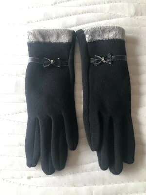 Guantes forrados de piel técnica negros sin marca con lazo pequeños NUEVO Foto 1 de 3