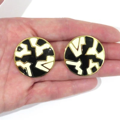 Vintage Monet Round Clip On Earrings Enamel Black Cream Gold Tone - Image 1 of 4
