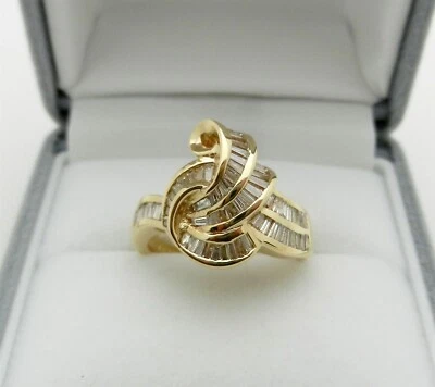 Anillo con nudo de diamantes conjunto de canales Baguette en oro amarillo sólido de 14 k 6 gr talla 6,25 Foto 1 de 4