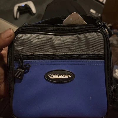 Case Logic CD Player Carrying Case 4-Pocket adjustable strap Blue Gray 7" - Image 1 of 4