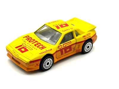 Matchbox MB2 Superfast 1985 Pontiac Fiero Protech Fire como nuevo en caja de exhibición de PVC Foto 1 de 4