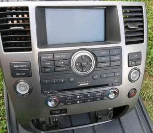 08-15 Nissan Armada QX56 Center Dash Bezel 4x4 Climate Control BOSE Radio OEM - Picture 1 of 12
