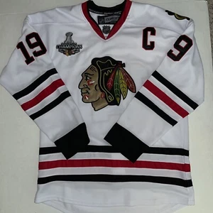 Camiseta deportiva de hockey RBK Reebok auténtica Jonathan Toews Chicago Blackhawks NHL blanca52 - Imagen 1 de 9