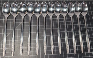 Set vintage di 12 cucchiaini da tè soda rosa radiante USA acciaio inox superiore - Foto 1 di 7