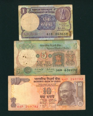 ((TRES BILLETES)) 1/5/10 Rupias Reserva Banco de la India **MONEDA ((AGUJEROS)) Foto 1 de 2