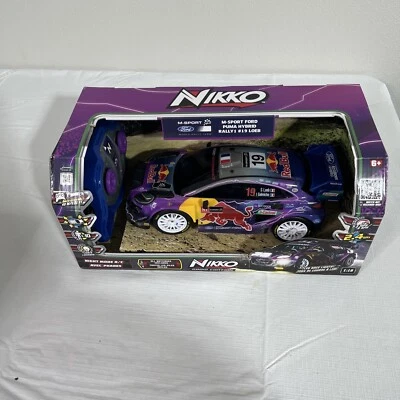 Nikko Remote Control M-Sport Ford Puma Hybrid Rally 1 #19 LOEB Red Bull 1:18 - Image 1 of 4