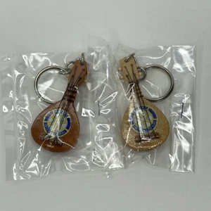 2x Rotary International Keychain Wooden Ukulele Celebrate 100 Years 2005 Chicago - Picture 1 of 6