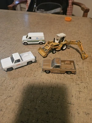ERTL 1/64 Scale International Harvester Backhoe Lot Trucks Bell System Bonus - Image 1 of 4