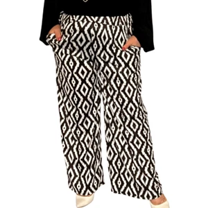 PANTALÓN MUJER ROCKTHOSECURVES NEGRO BLANCO ESTAMPADO DIAMANTE BOLSILLO LATERAL PALAZZO - Imagen 1 de 4