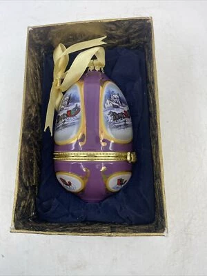 Adorno de huevo musical púrpura Mr. Christmas "Vino una medianoche transparente" Foto 1 de 4